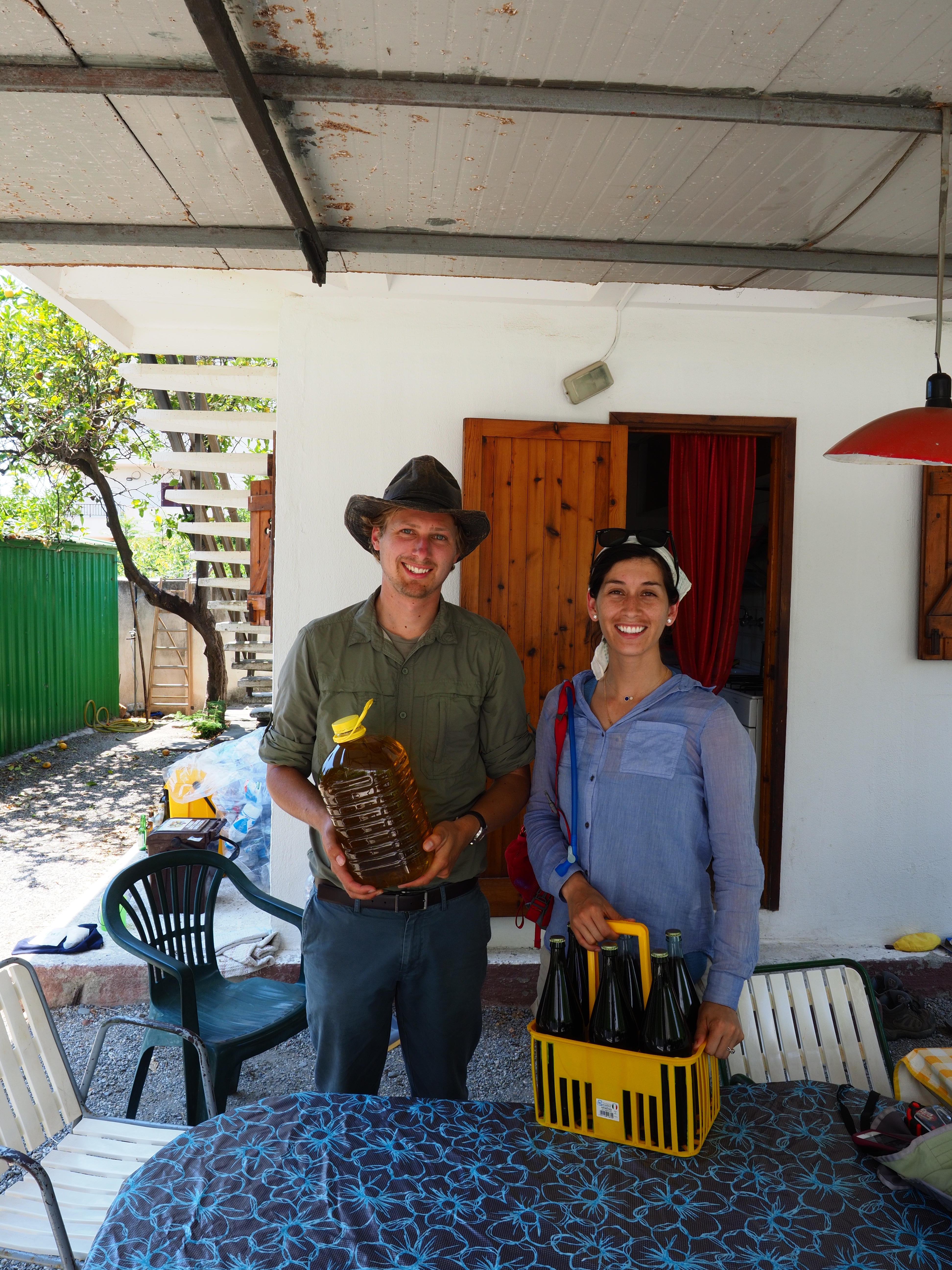 SDSU MA student Yesenia Garcia (left) and University of Notre Dame PhD student Nicholas Ames (right), demonstrate some of the perks of a community-engaged approach to archaeology in Calbaria, Italy!