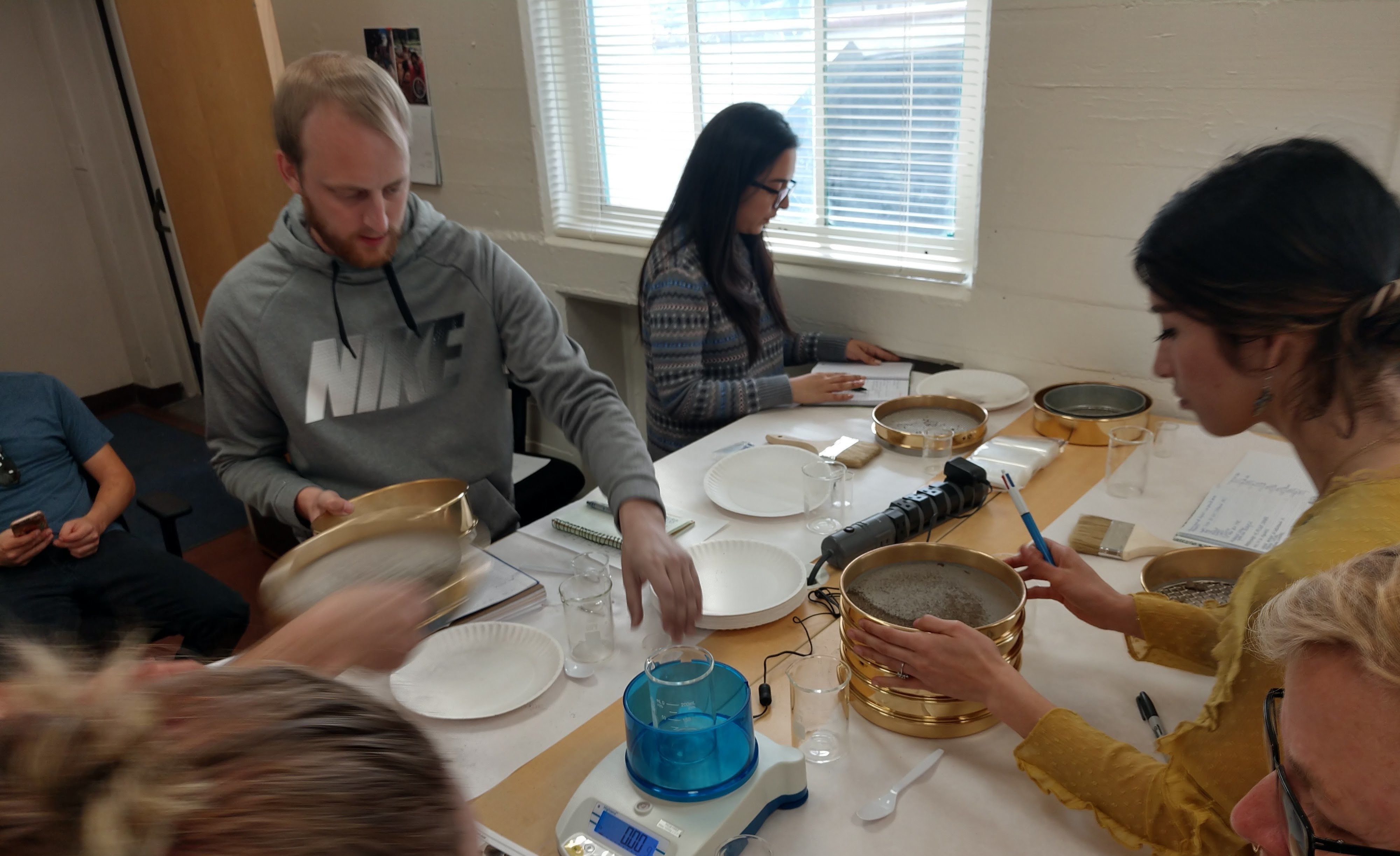 Students undertake sediment granulometry analysis in the Computational Archaeology Laboratory.